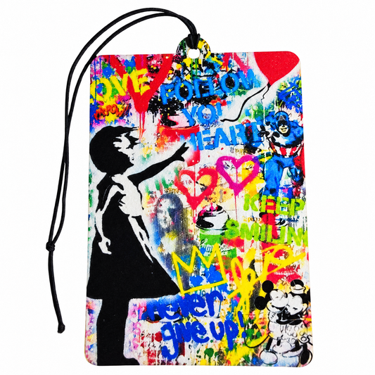 Banksy inspired graffiti car air freshener featuring a girl silhouette reaching towards a red balloon, colourful street art, spray paint and hearts with black hanging cord.
