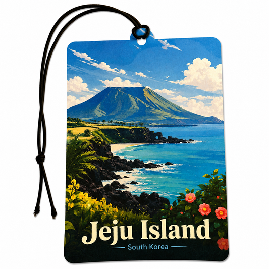 Jeju Island South Korea inspired car air freshener featuring volcanic mountains, bright blue coastal waters, rocky shoreline and colourful island flowers.
