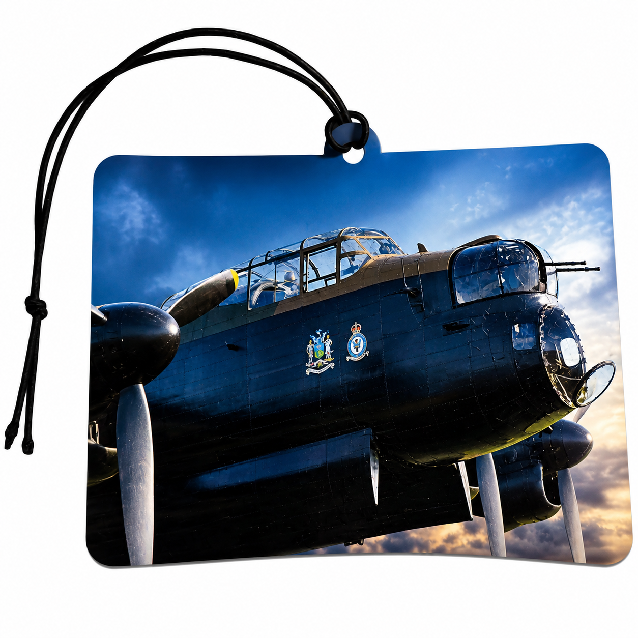 Rectangular car air freshener tag featuring a printed photograph of a dark blue military propeller plane against a blue sky with sunset clouds. The tag has rounded corners, a black hanging loop, and a small round hole at the top.