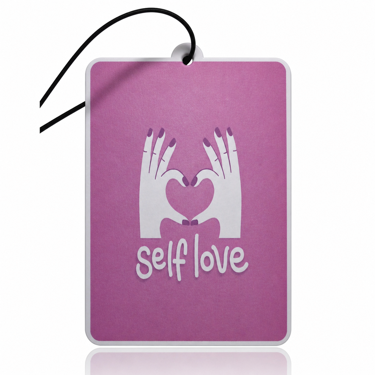 Pink car air freshener with 'self love' text and hand design on a white background