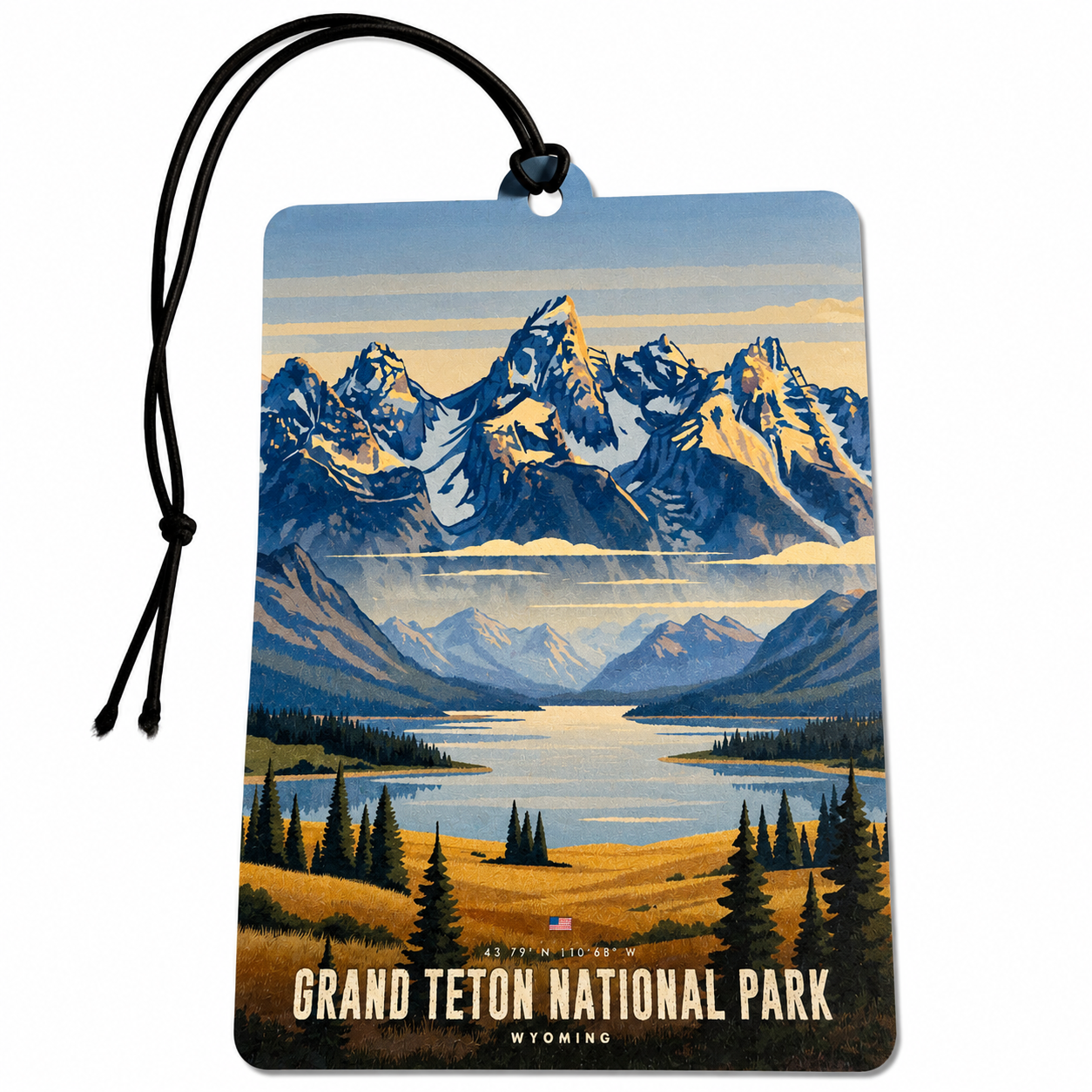 Grand Teton National Park Wyoming inspired car air freshener featuring dramatic mountain peaks, a peaceful lake, evergreen trees and golden wilderness landscape.