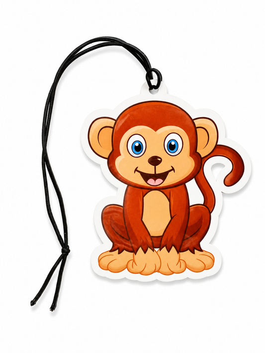 Cute cartoon monkey hanging air freshener with a smiling face and black hanging cord on a white background.