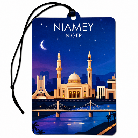 A rectangular travel air tag or car air freshener with a black hanging cord, printed with an illustrated night scene of Niamey, Niger. The design shows a crescent moon, stars, a mosque with minarets, a bridge over water, and the text 'NIAMEY NIGER' at the top, on a white background.