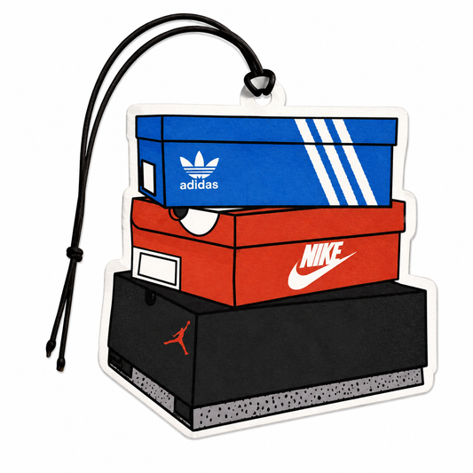 A ca air freshener or charm featuring a stack of three sneaker boxes: a blue Adidas box on top, followed by a red Nike box, and a black Jordan box at the bottom, with a black hanging loop at the top, shown on a white background.