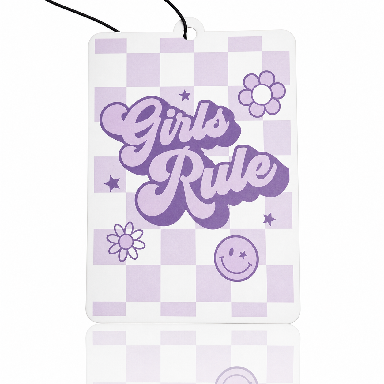 Car air freshener with 'Girls Rule' text on a checkered background