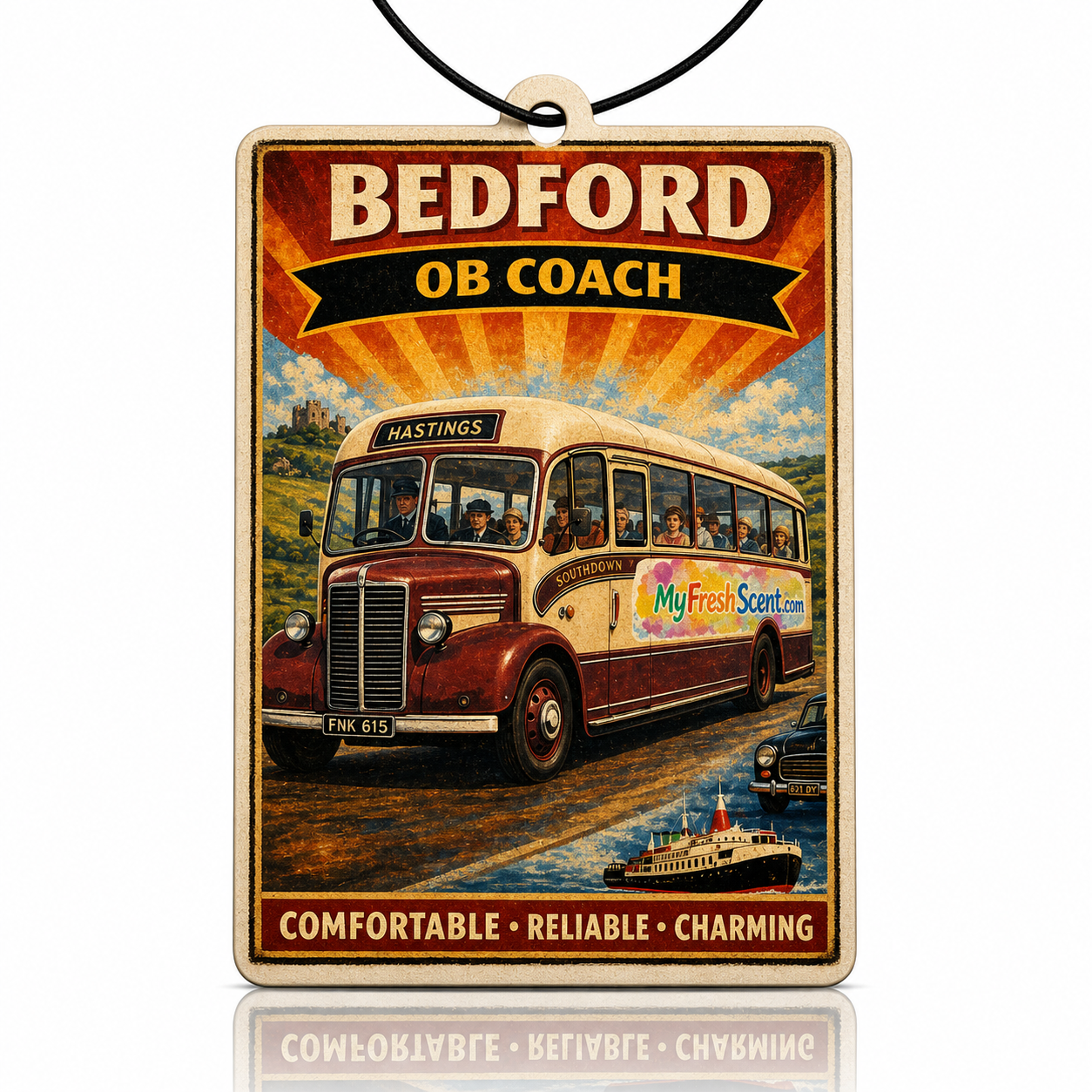 Car air freshener with a red and white bus and 'Bedford OB Coach' text on a scenic background