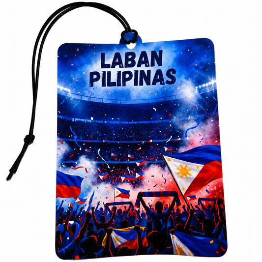 A rectangular car air freshener or tag with a black hanging cord, printed with a vibrant graphic of a Filipino sports crowd and the text 'LABAN PILIPINAS'. The design features the Philippine flag, stadium lights, and confetti in blue, red, and white.